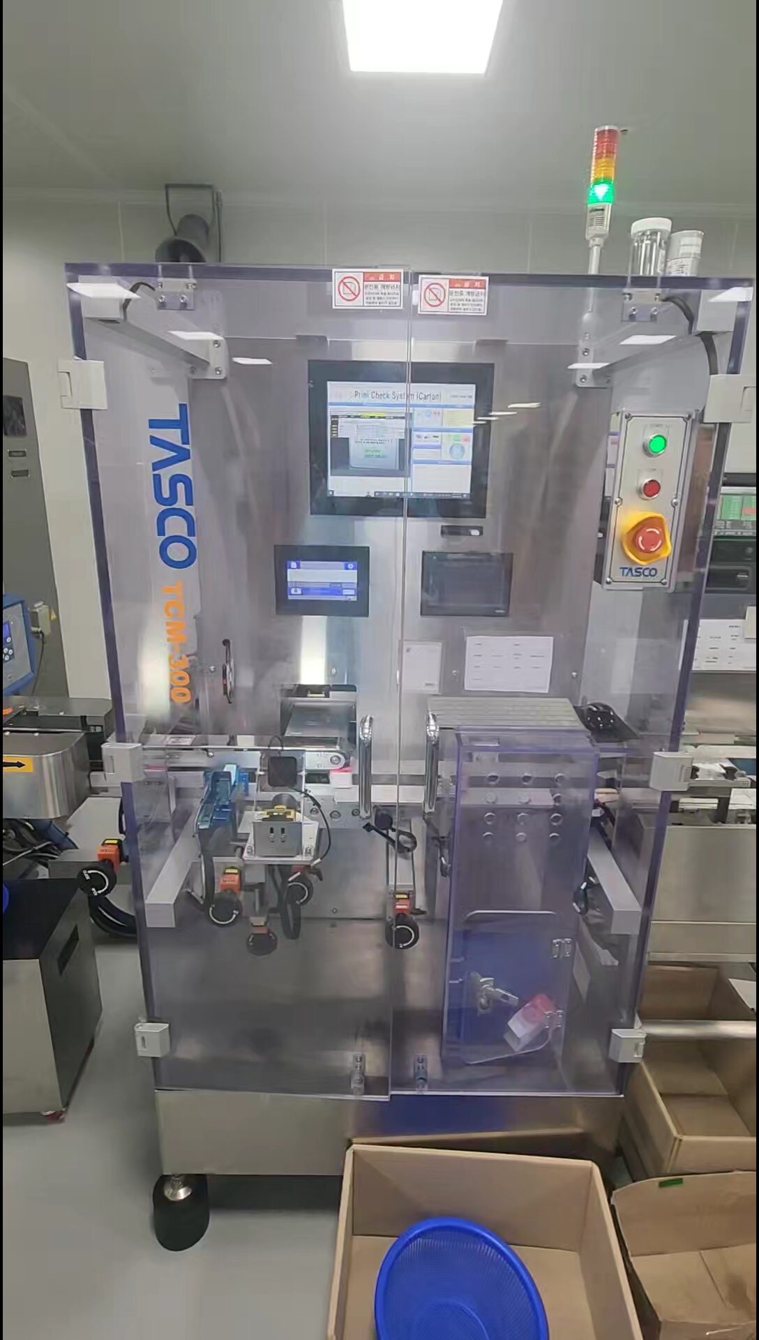 PCS(Print Check System)를 실행 중인 TCM-300 카톤 인쇄기